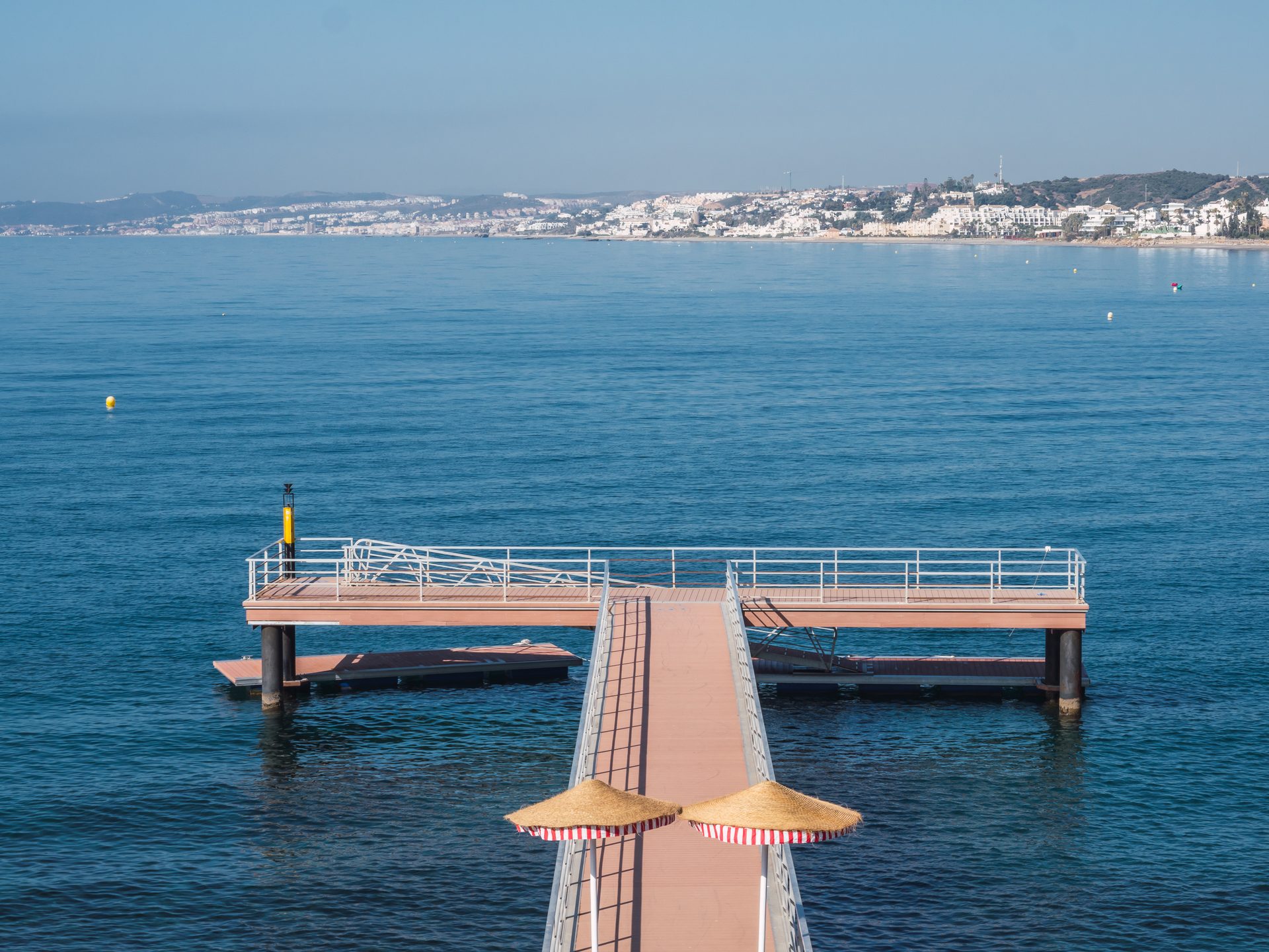 Oceanfront room with balcony, stunning sea view, and private dock access.